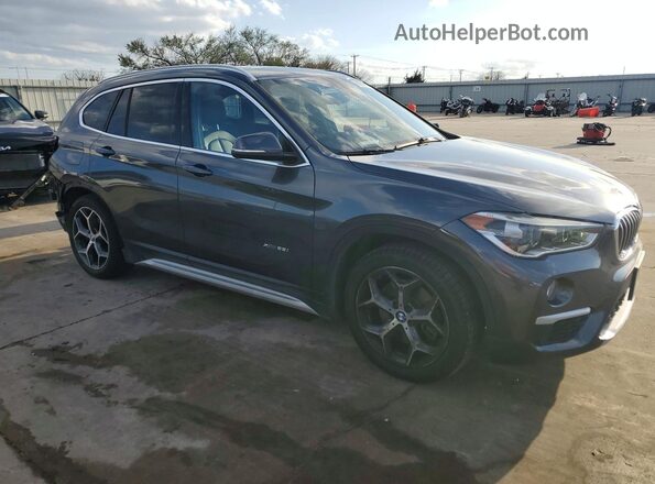 WBXHT3C38G5F66332 2016 BMW X1 Gray Delantero derecho