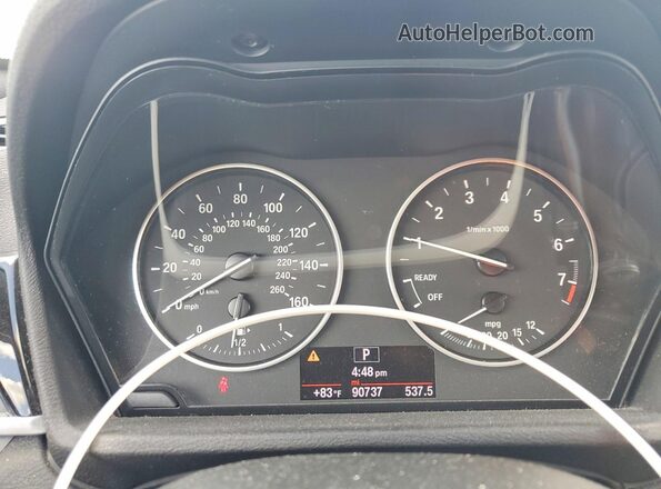 WBXHT3C38G5F66332 2016 BMW X1 Gray Vista del cuadro de instrumentos