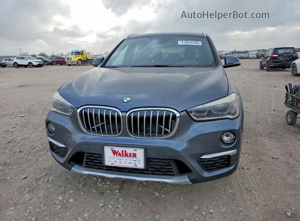 WBXHT3C38H5F82533 2017 BMW X1 Серый Вид спереди