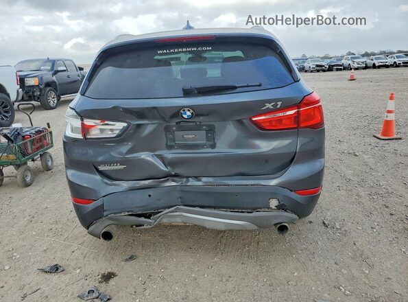 WBXHT3C38H5F82533 2017 BMW X1 Серый Вид сзади