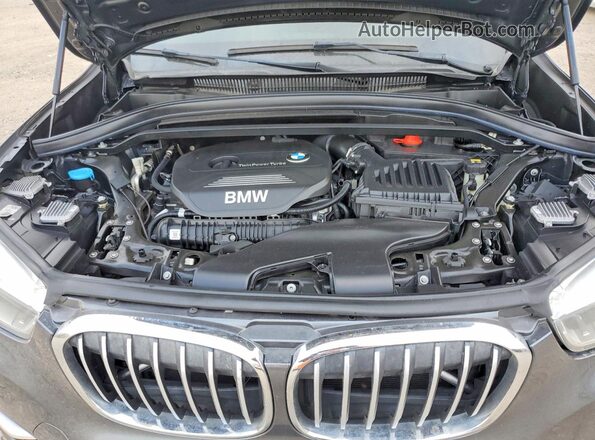 WBXHT3C38H5F82533 2017 BMW X1 Серый Вид задней части салона