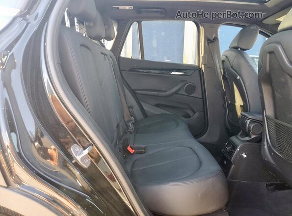 WBXHT3C39J5L27103 2018 BMW X1 Black Widok wnętrza z tyłu