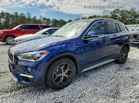 WBXHT3C50K3H34003 2019 BMW X1 Синий Передняя левая четверть