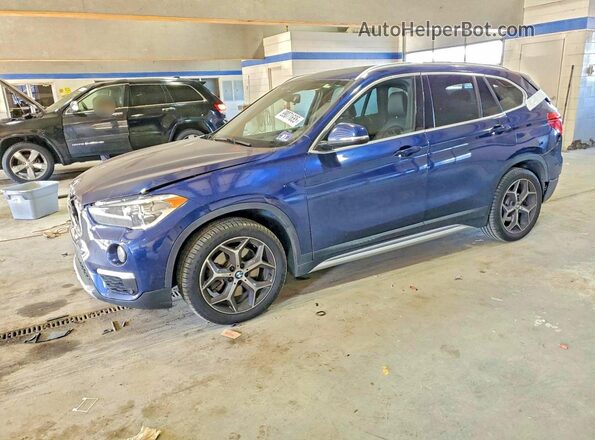 WBXHT3C59K5L37990 2019 BMW X1 Синий Передняя левая четверть