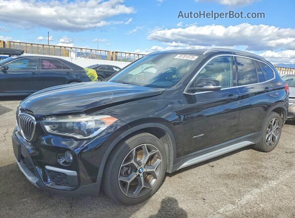 WBXHT3Z32G4A50562 2016 BMW X1 Черный Передняя левая четверть