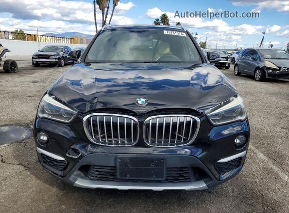 WBXHT3Z32G4A50562 2016 BMW X1 Черный Вид спереди