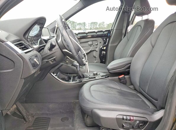 WBXHT3Z34G4A48778 2016 BMW X1 Black Widok wnętrza z przodu