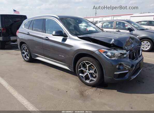 WBXHT3Z36H4A65695 2017 BMW X1 Серый Передняя правая четверть