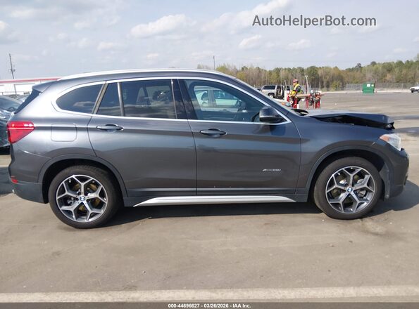 WBXHT3Z36H4A65695 2017 BMW X1 Серый Вид задней части салона
