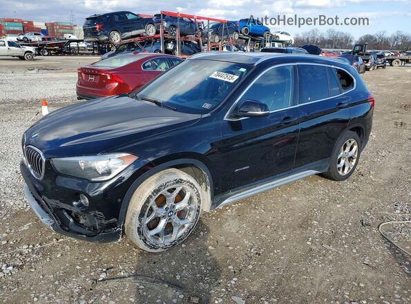 WBXHT3Z39J4A65924 2018 BMW X1 Черный Передняя левая четверть