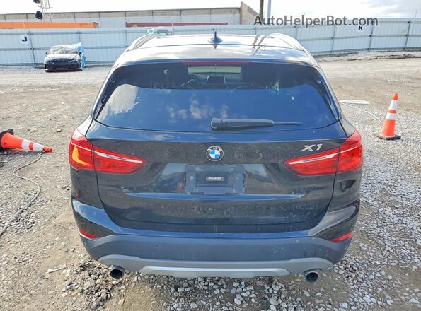 WBXHT3Z39J4A65924 2018 BMW X1 Черный Вид сзади