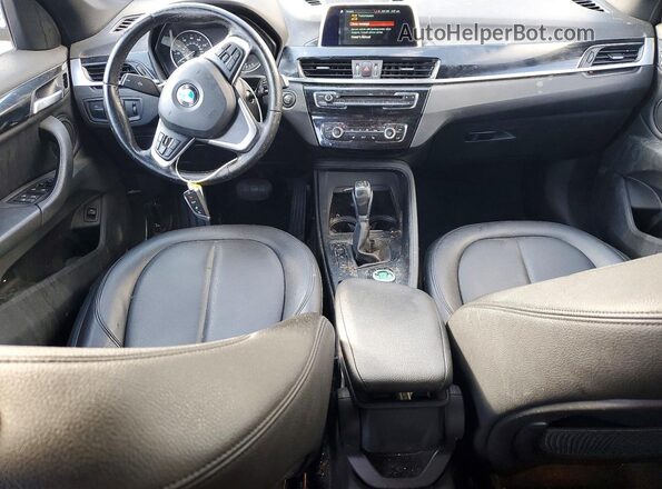 WBXHT3Z39J4A65924 2018 BMW X1 Черный Вид панели приборов