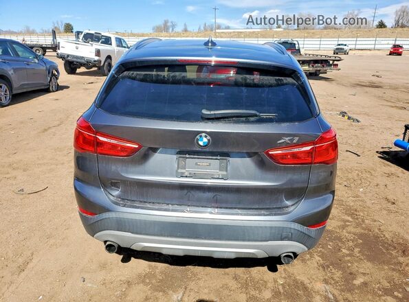 WBXHT3Z3XG4A49112 2016 BMW X1 Charcoal Widok z tyłu
