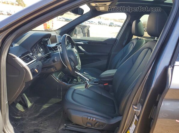 WBXHT3Z3XG4A49112 2016 BMW X1 Charcoal Widok wnętrza z przodu