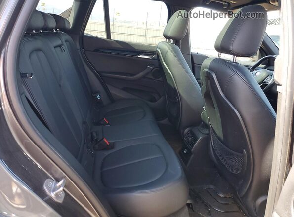 WBXHT3Z3XG4A49112 2016 BMW X1 Charcoal Widok tylnych siedzeń