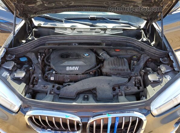 WBXHT3Z3XG4A49112 2016 BMW X1 Charcoal Widok wnętrza z tyłu