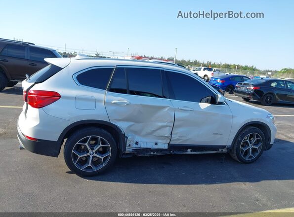WBXHU7C32J5H43355 2018 BMW X1 Белый Вид задней части салона
