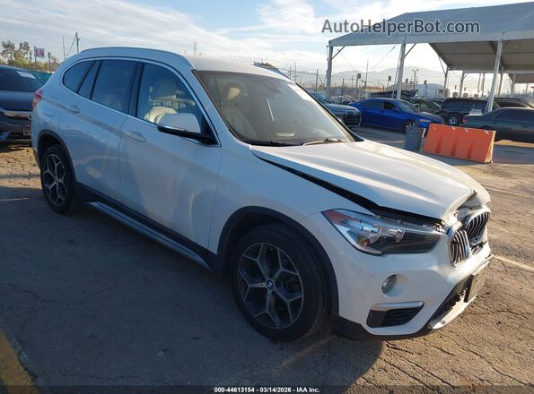 WBXHU7C5XK5L11208 2019 BMW X1 Белый Передняя правая четверть