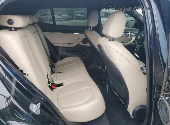 WBXYJ5C58K5N79591 2019 BMW X2 Black Vista interior trasera