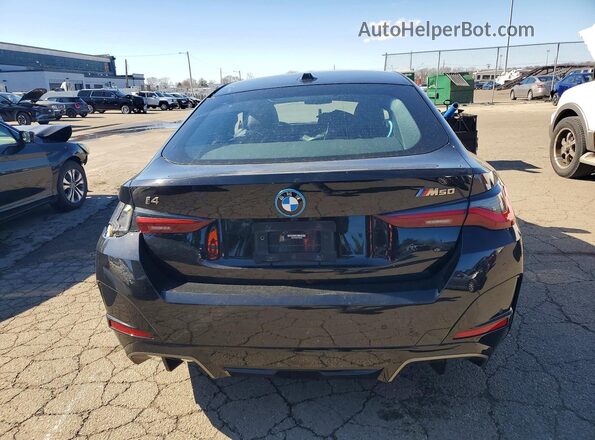 WBY33AW00PFP03458 2023 BMW I4 Black Rear view