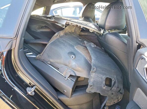 WBY33AW00PFP03458 2023 BMW I4 Black Rear seats view