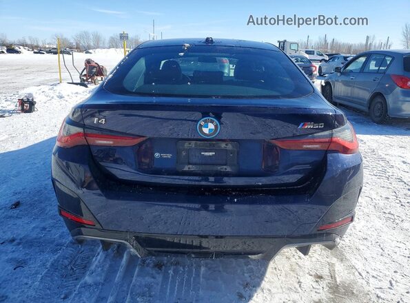 WBY33AW05NFM60680 2022 BMW I4 Blue Widok z tyłu
