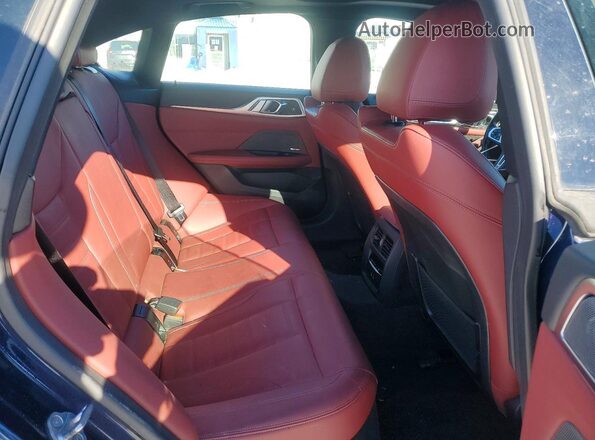 WBY33AW05NFM60680 2022 BMW I4 Blue Widok tylnych siedzeń