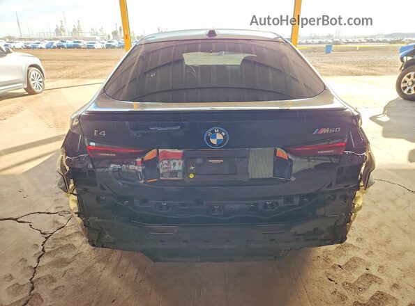 WBY33AW08NFM77487 2022 BMW I4 Black Вид ззаду