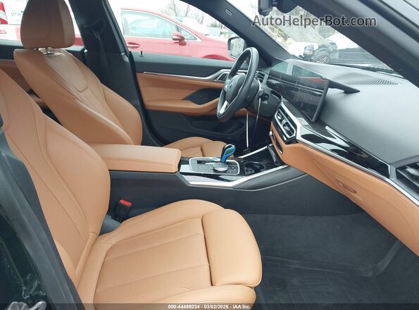 WBY43AW00PFP53264 2023 BMW I4 Green Front interior view