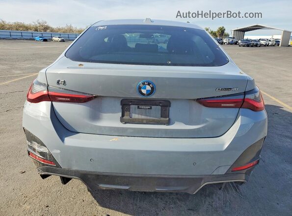 WBY73AW06NFN25084 2022 BMW I4 Gray Widok z tyłu
