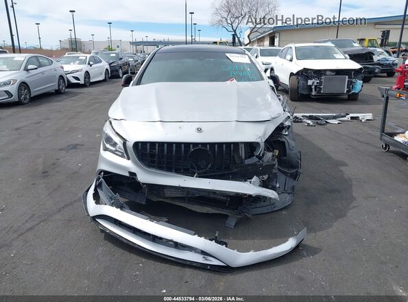 WDDSJ4EBXJN581024 2018 MERCEDES-BENZ CLA 250 Серебряный Вид задней части салона