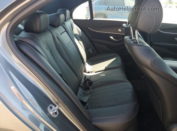 WDDZF4KBXKA593378 2019 MERCEDES-BENZ E Gray Vista de los asientos traseros