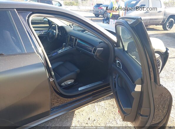 WP0AA2A71GL000980 2016 PORSCHE PANAMERA Черный Вид салона спереди