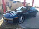2016 Porsche Panamera 4 Черный vin: WP0AA2A76GL002112