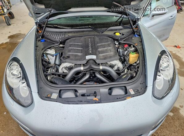 WP0AB2A73GL050177 2016 PORSCHE PANAMERA Серебряный Вид задней части салона