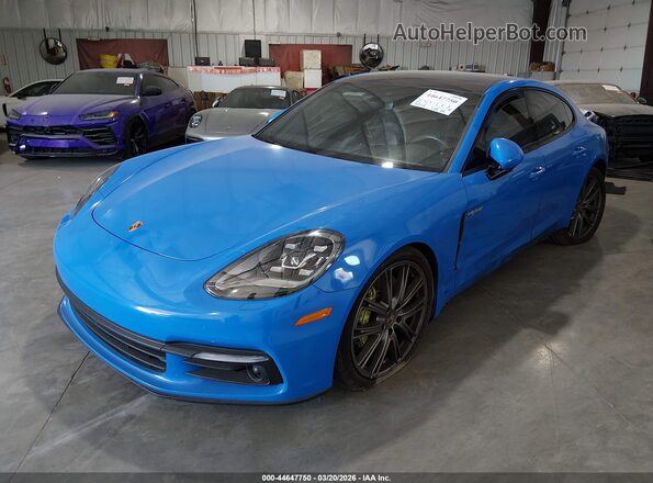 WP0AE2A73LL132265 2020 PORSCHE PANAMERA E-HYBRID Blue Vista tres cuartos delantera izquierda