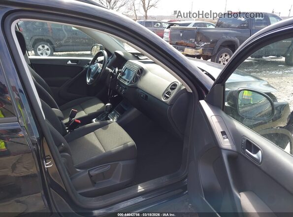 WVGAV7AX2HK042014 2017 VOLKSWAGEN TIGUAN Black Widok wnętrza z przodu