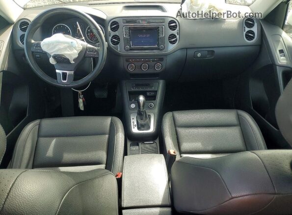 WVGAV7AX7GW613214 2016 VOLKSWAGEN TIGUAN Белый Вид панели приборов