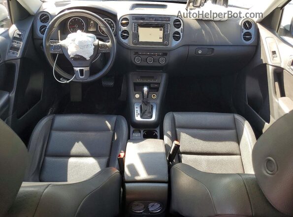 WVGAV7AX8GW506480 2016 VOLKSWAGEN TIGUAN Белый Вид панели приборов