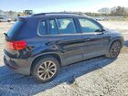 2018 Volkswagen Tiguan Limited Черный vin: WVGAV7AX9JK000476
