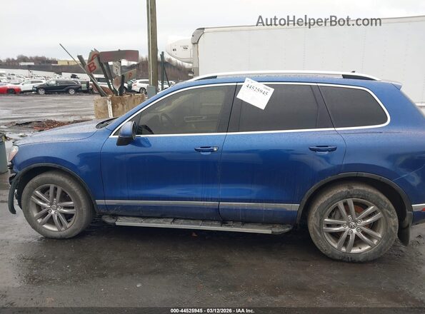 WVGEF9BP9GD003397 2016 VOLKSWAGEN TOUAREG Синий Вид задней части салона