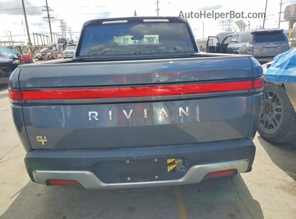 7FCTGAAA4NN007706 2022 RIVIAN RIT Серый Вид салона спереди