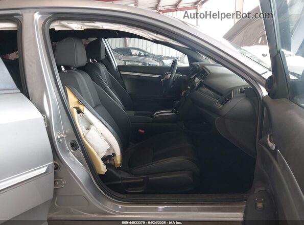 19XFC2F89KE212822 2019 HONDA CIVIC Серебряный Вид салона спереди