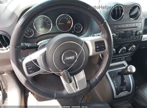 1C4NJCEA3GD735323 2016 JEEP COMPASS Черный Вид панели приборов