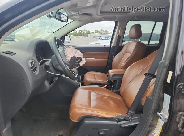 1C4NJCEA4GD747948 2016 JEEP COMPASS Черный Вид салона спереди