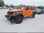 2025 Jeep Wrangler 4-door Summit 4x4 Orange vin: 1C4PJXDN9SW625488