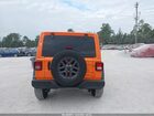 2025 Jeep Wrangler 4-door Summit 4x4 Orange vin: 1C4PJXDN9SW625488
