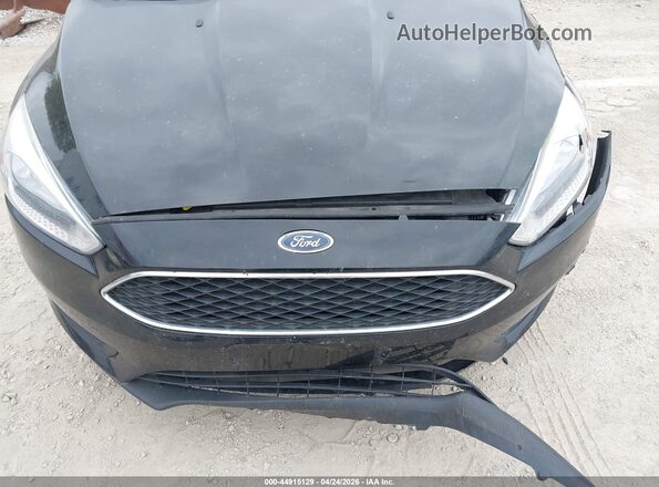 1FADP3F22HL298445 2017 FORD FOCUS Черный Вид задней части салона