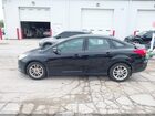 2016 Ford Focus Se Черный vin: 1FADP3F23GL202563