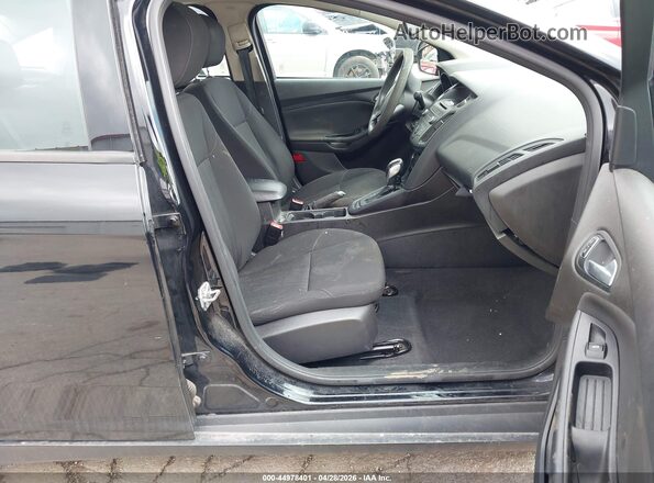 1FADP3F23GL202563 2016 FORD FOCUS Черный Вид салона спереди